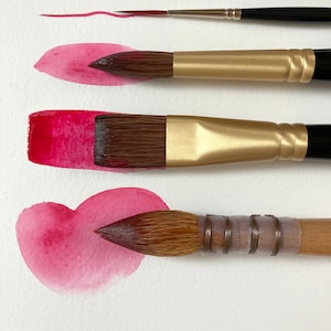 May include: Four paintbrushes of different sizes and shapes, with a red watercolor wash painted on a white paper background. The brushes are arranged vertically, with the smallest brush at the top and the largest brush at the bottom. The watercolor wash is a light pink color and is in the shape of a heart.