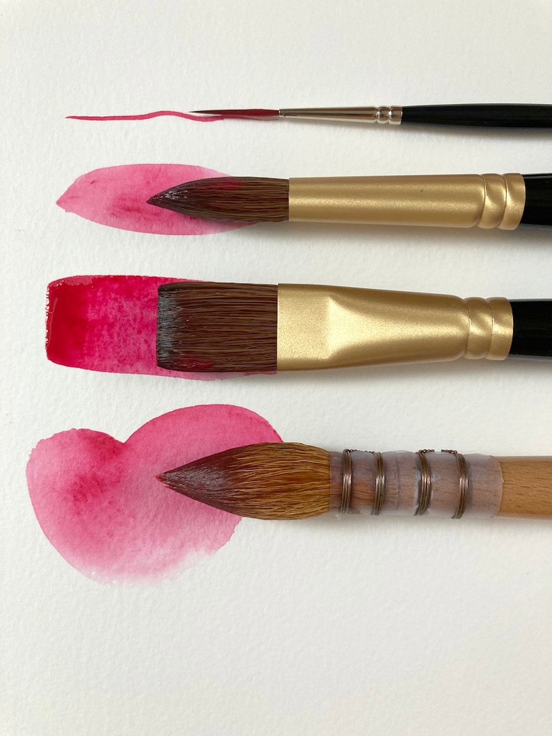 May include: Four paintbrushes of different sizes and shapes, with a red watercolor wash painted on a white paper background. The brushes are arranged vertically, with the smallest brush at the top and the largest brush at the bottom. The watercolor wash is a light pink color and is in the shape of a heart.