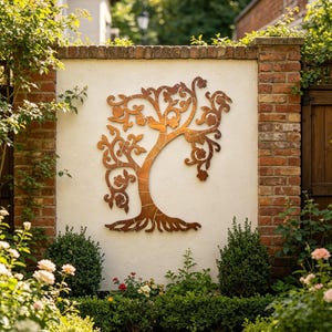 May include: A decorative wall art piece featuring a stylised tree with intricate branches, leaves, and small bird silhouettes. The artwork is constructed from a copper-toned metal with a segmented, mosaic-like surface texture and a dark outline.