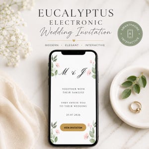 Pode incluir: Um smartphone exibindo um convite de casamento eletrônico com motivos de eucalipto e flores rosas. A tela mostra as iniciais M & J, a data 25.07.2026 e um botão dourado com o rótulo VIEW INVITATION. O texto diz EUCALYPTUS ELECTRONIC WEDDING INVITATION.