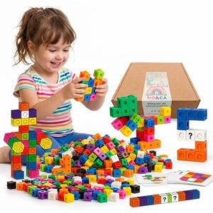 May include: A set of colorful plastic interlocking cubes in various shades including red, blue, green, yellow, orange, purple, black, and white. The set includes a cardboard box labeled MO&CA, several assembled figures, and printed activity cards.