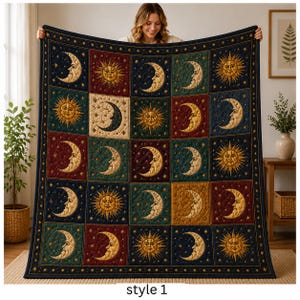 May include: A rectangular quilt featuring a grid of squares with alternating sun and moon face illustrations. The quilt has a dark blue border with gold stars and a color palette of deep red, forest green, navy blue, and golden yellow.