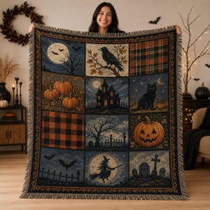 May include: A woven throw blanket featuring a grid of nine Halloween-themed panels, including a crow, a black cat, a haunted house, a witch on a broomstick, pumpkins, a graveyard, and orange and black plaid patterns with fringed edges.