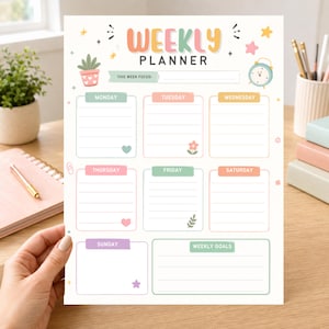 May include: A weekly planner sheet featuring the text WEEKLY PLANNER at the top. The layout includes seven daily sections with lines for notes, a section for weekly goals, and a space for this week focus. It is decorated with pastel icons.