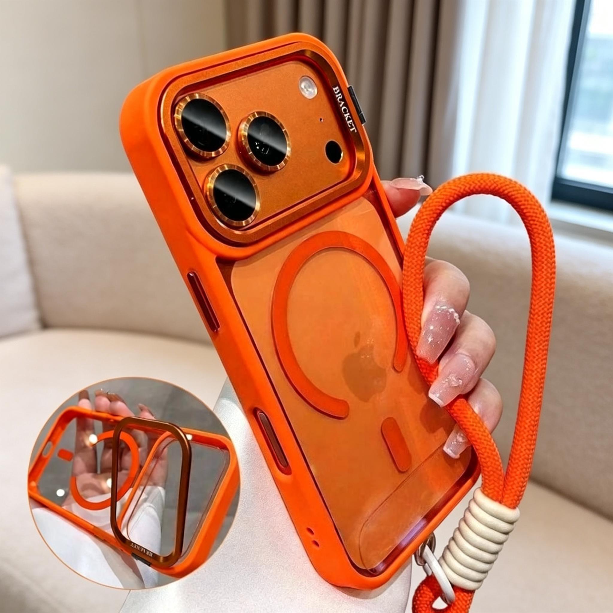 May include: Orange phone case with a clear back and gold-coloured accents. The case has a matching orange lanyard. The word "BRACKET" is printed on the side of the case.