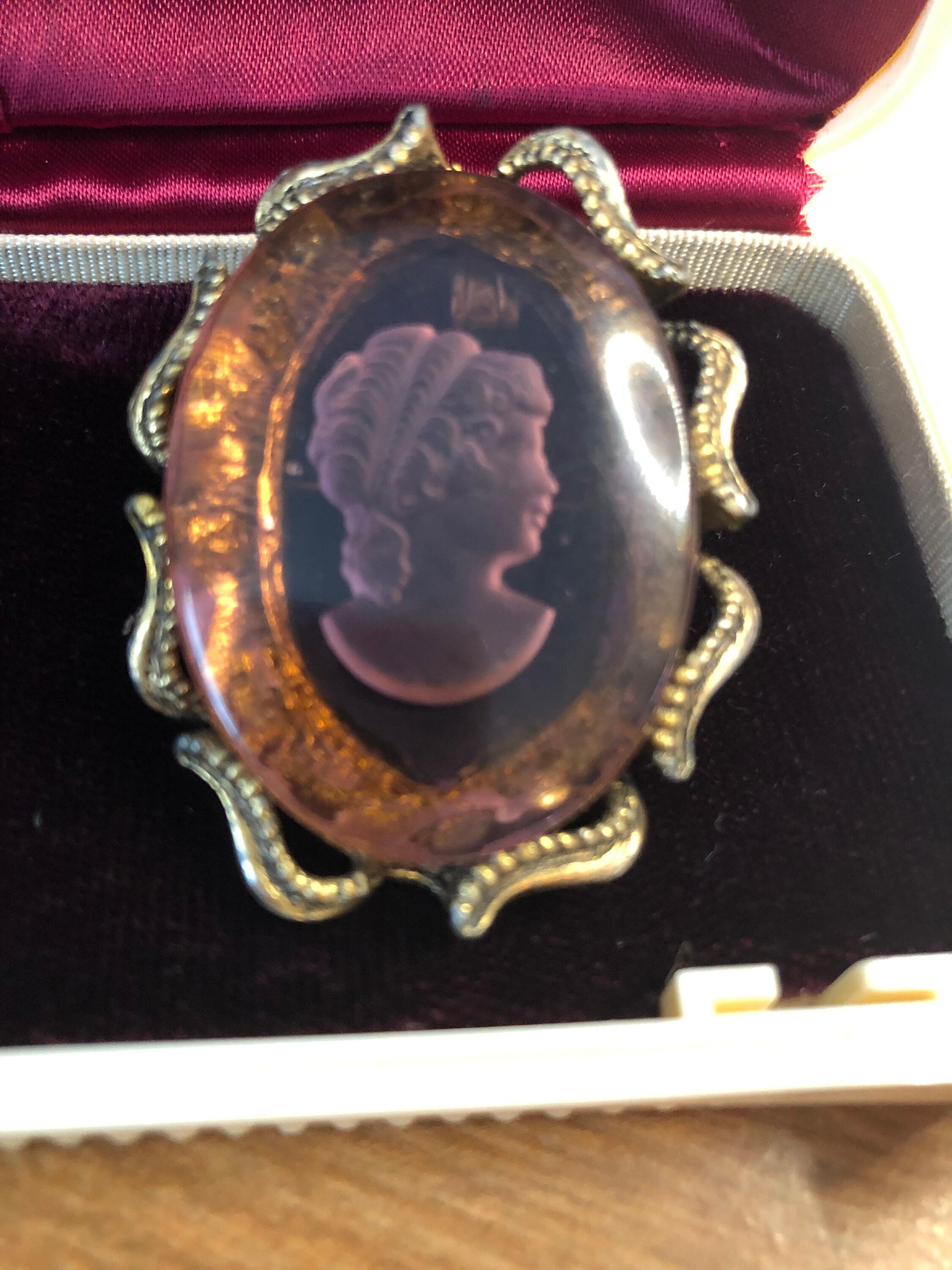 purple cameo brooch