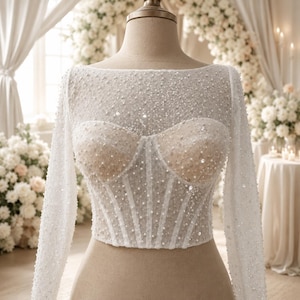 Custom made transparent lace wedding corset with beads and sequins.