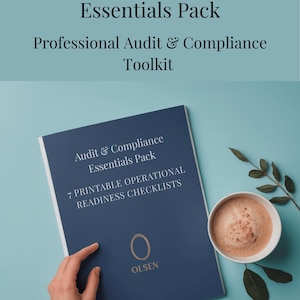 May include: A navy blue book titled "Audit & Compliance Essentials Pack" with the text "7 Printable Operational Readiness Checklists." A cup of coffee and a sprig of leaves sit on a light blue surface. The book is held by a hand.