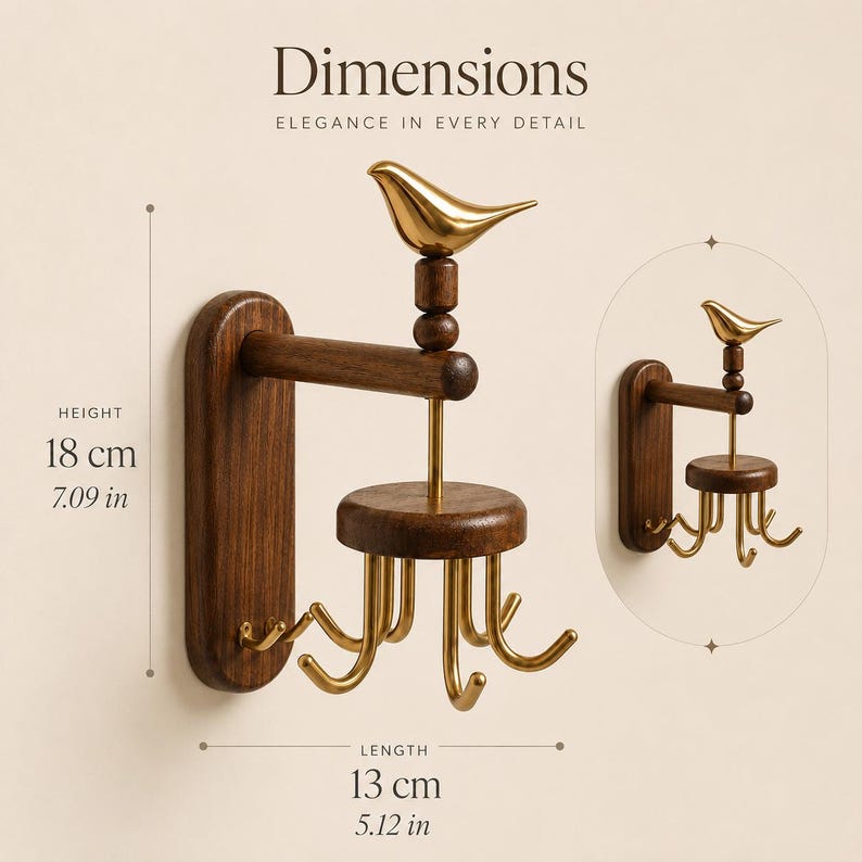 May include: A wall-mounted hook rack featuring a dark wood base, a gold-toned metal bird ornament, and a rotating circular wooden platform with five gold-toned metal hooks. The total height is 7.09 inches and the total length is 5.12 inches.