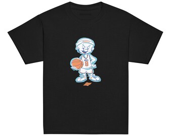 May include: A black short-sleeve t-shirt featuring a cartoon character wearing a white headband with the word HUSTLE, a white basketball jersey with OKC and the number 9, and white sneakers while holding an orange basketball.