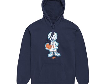 May include: A navy blue hooded sweatshirt featuring a graphic of a cartoon character wearing a basketball uniform with the text OKC and the number 9. The character holds a basketball, and a small orange logo is printed below the graphic.