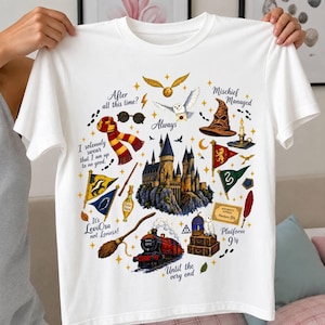 May include: A white t-shirt featuring a colorful graphic print of a castle, a steam train, a sorting hat, a scarf, glasses, a broomstick, an owl, and various magical icons, accompanied by the text "After all this time?", "Always", "Mischief Managed", "I solemnly swear that I am up to no good", "It's LeviOsa not Leviosa!", and "Platform 9 3/4".