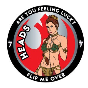 May include: Two circular coins featuring a character in a green bikini and metal chain. The left coin reads ARE YOU FEELING LUCKY, HEADS, and FLIP ME OVER. The right coin reads DO YOU WANT TO PLAY A GAME, TAILS, and FLIP ME OVER with a red Rebel logo.