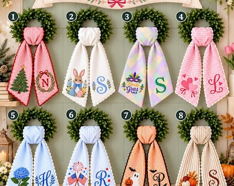 May include: An All season Sash Bundle featuring eight decorative fabric sashes with various seasonal prints and embroidered letters, each attached to a small green wreath. Designs include Christmas, Easter, Mardi Gras, Valentine's, floral, patriotic, Halloween, and autumn themes.
