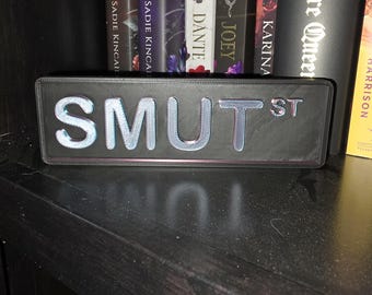 Letrero de estantería para libros eróticos