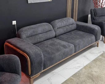 Set moderno di divano componibile e poltrona, mobili minimalisti grigi per soggiorno.