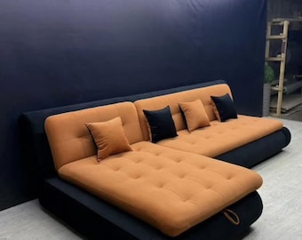 Ein wandelbares Ecksofa mit einer großen Schublade für Bettwäsche und Aufbewahrung