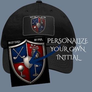 May include: Black baseball cap with a golf-themed crest. The crest features a shield design with golf clubs, a golf ball, and a golf bag. The text "BEST DAD BY PAR" is displayed on the crest. The text "PERSONALIZE YOUR OWN INITIAL" is also visible.