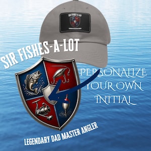 May include: A grey baseball cap with a black patch displaying a crest and the text "SIR FISHES-A-LOT." A shield graphic with fishing illustrations and the text "LEGENDARY DAD MASTER ANGLER" is also shown. The image also includes the text "PERSONALIZE YOUR OWN INITIAL."