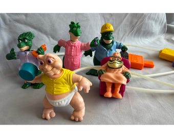Set di action figure vintage Disney Dinosaurs TV Show con motore ad aria compressa della famiglia Sinclair