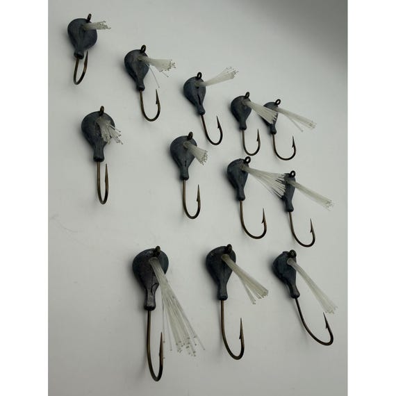 12 oz lead fishing hooks Jetty Caster style bullet jigs, bare TinMan Tackle The Strike King Swinging Sugar Buzz generates more action than most bass can stand Fishing Hook - Baitholder Hooks