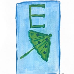 May include: Watercolor illustration of the letter "E" in green, with a green cocktail umbrella below it, set against a light blue background. The artwork has a hand-painted aesthetic, with visible brushstrokes and a signature in the bottom right corner.