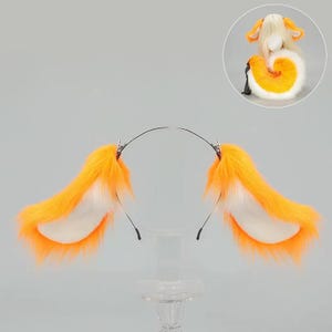 Puede incluir: Una diadema con orejas de zorro de piel sintética naranja y blanca. Las orejas son esponjosas y detalladas, con un exterior naranja brillante y un interior blanco. Una imagen más pequeña muestra una cola a juego.