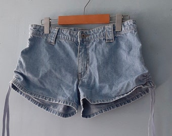 Vintage Y2k low rise faded jean shorts / Light wash blue denim shorts with ties / Nevada summer shorts / Size 8