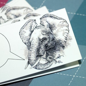 May include: A black and white illustration of an elephant's head with a speech bubble. The elephant has large ears and a trunk. The speech bubble is blank.