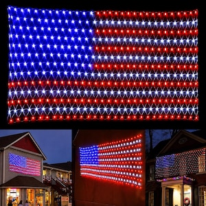 May include: A rectangular LED net light display arranged in the pattern of the American flag, featuring a blue field with white lights and alternating horizontal red and white light stripes, shown mounted on the exterior walls of residential buildings.