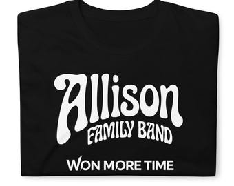 May include: A black t-shirt featuring white text that reads Allison FAMILY BAND in a stylized font, with the text WON MORE TIME printed in a clean, sans-serif font directly underneath the band name on the front of the garment.