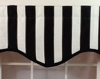 Black and white striped shaped valance with black pleated French pleated ribbon trim and optional  curtain rod