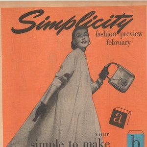 May include: A vintage Simplicity fashion magazine ad featuring a woman wearing a white coat and holding a handbag. The ad text reads "Simplicity fashion preview february" and "your simple to make wardrobe".