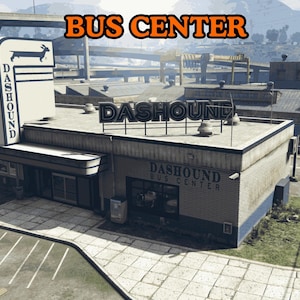 Può includere: Vista esterna del Dashound Bus Center. L'edificio presenta un'insegna con la silhouette di un bassotto e le parole "Dashound" e "Bus Center". L'edificio è grigio con finiture blu e un'insegna con la scritta "Bus Center" in arancione.