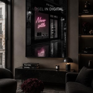 May include: A rectangular wall art print featuring a dark street scene with a storefront window. The window displays a pink neon sign that reads Never settle, with the text PRADA and AMSEL IN DIGITAL visible above. The scene includes a handbag.