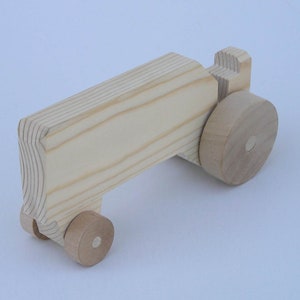 Wooden Toy Tractor.  A simple handmade toy tractor in the natural wood.