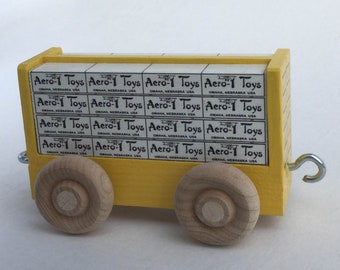 Yellow Lumber Car for wooden toy trains.