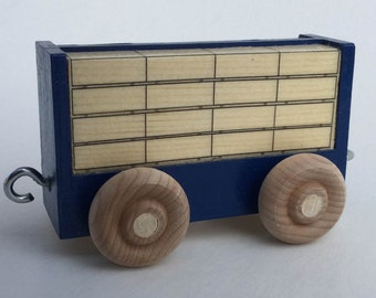 Blue Lumber Car for wooden toy trains.