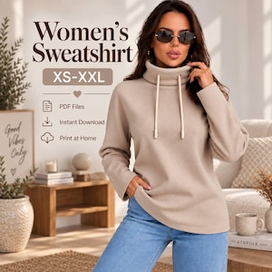 May include: A beige long-sleeve sweatshirt with a high cowl neck and two cream-colored drawstrings. The image includes text: Women's Sweatshirt, XS-XXL, PDF Files, Instant Download, and Print at Home. The garment is paired with light blue jeans.