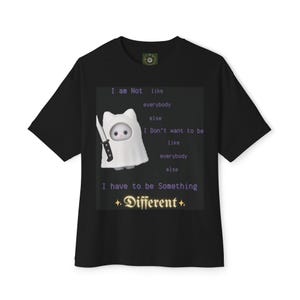 May include: Black t-shirt with a graphic of a white ghost-like figure holding a knife. The text reads: "I am Not like everybody else. I Don't want to be like everybody else. I have to be Something Different."