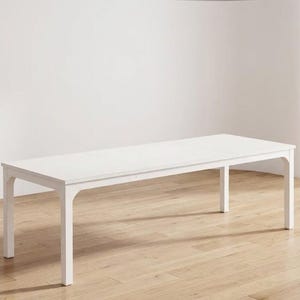 Stół recepcyjny „Archi-White” – minimalistyczny design i łukowate narożniki