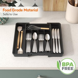 May include: A black plastic utensil organizer with compartments holding silverware, a whisk, and cooking brushes. The text "Food Grade Material Safe to Use" and "BPA FREE" are visible.