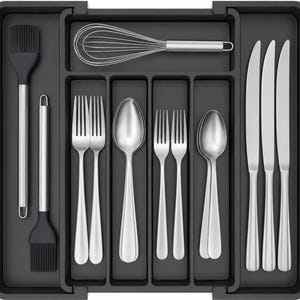 May include: A dark gray kitchen utensil organizer filled with stainless steel silverware, including forks, spoons, and knives. A whisk and two silicone basting brushes are also visible. The organizer is designed to keep kitchen tools neatly arranged.