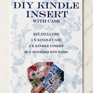 May include: A white DIY Kindle insert kit with a floral pattern and the text "DIY Kindle Insert With Case." The kit contains a Kindle case, two inserts, and 20 bookish stickers. A hand holds a selection of stickers.