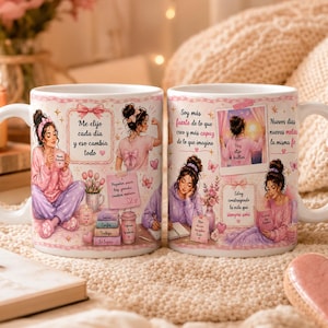 May include: Two white ceramic mugs featuring a pink-toned illustration of a person in various daily activities. The mugs display Spanish text including 'Me elijo cada día y eso cambia todo', 'Soy más fuerte de lo que creo', and 'Nuevos días nuevas metas'.