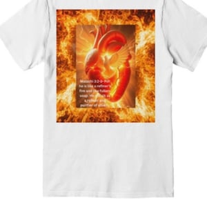 May include: White t-shirt featuring a graphic of a fiery heart with a dove and text from Malachi 3:2-3. The design is in shades of red, orange, and yellow, resembling flames. The text reads "Malachi 3:2-3- For he is like a refiner's fire and like fullers soap."