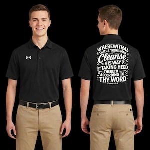 May include: Black polo shirt with a white logo on the left chest. The back of the shirt features white text that reads "WHEREWITHAL SHALL A YOUNG MAN CLEANSE HIS WAY? BY TAKING HEED THERETO ACCORDING TO THY WORD Psalm 119:9". The shirt is paired with khaki pants.