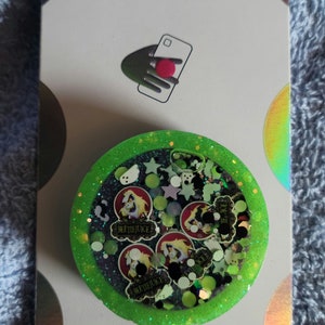 Cute beetleguy phone grippy or badgereel