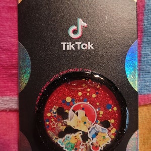 Cute poke game shaker phone grippy or badgereel