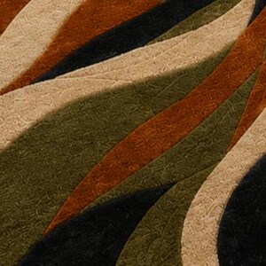 May include: A rectangular area rug featuring a textured, multi-colored pattern of sweeping, curved bands in shades of deep rust orange, olive green, black, and light beige. The surface has a carved, dimensional pile with varying heights.